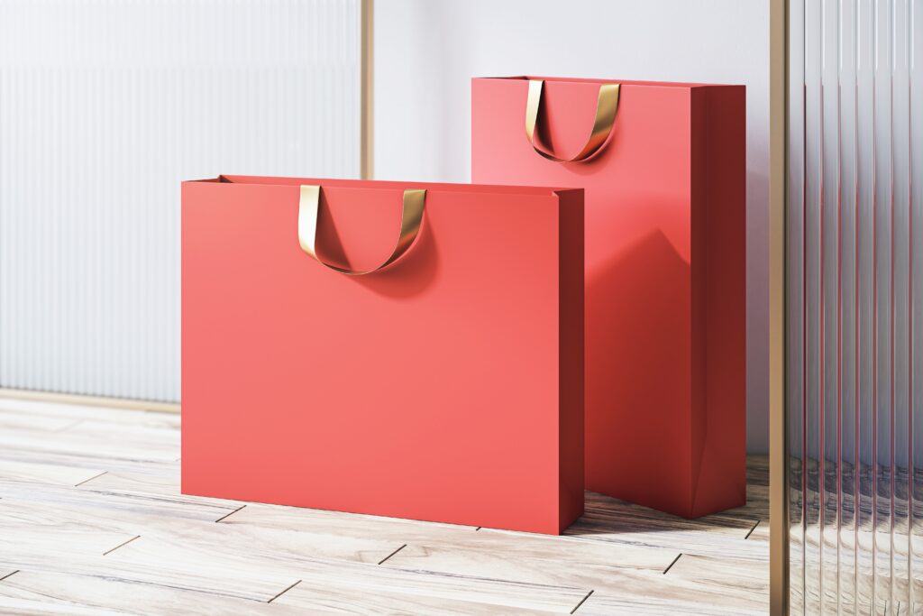 Perspective,View,On,Blank,Red,Paper,Shopping,Bags,With,Space